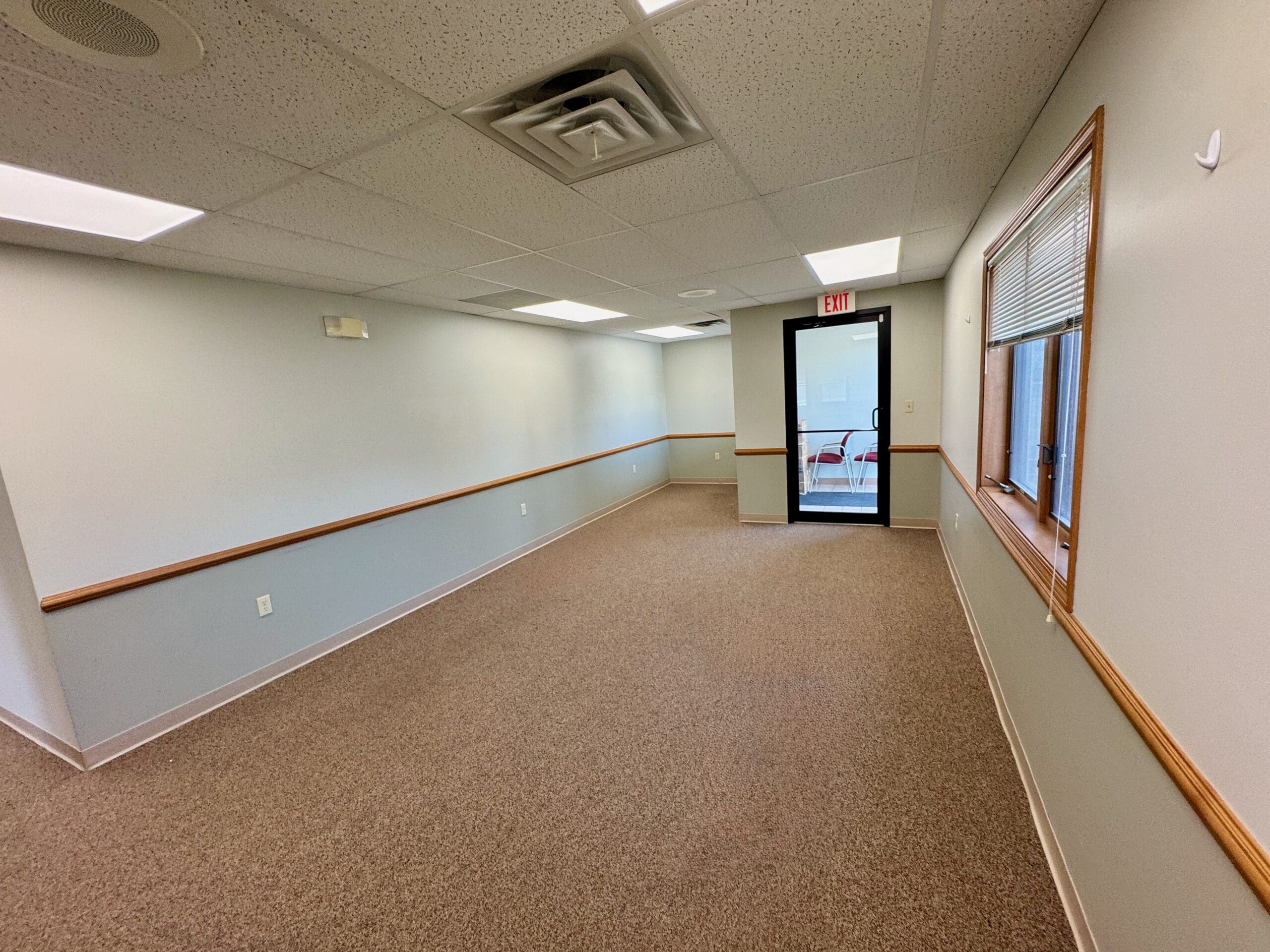 Medical office waiting room with carpet and natural light at 500 Legacy Plaza West in La Porte