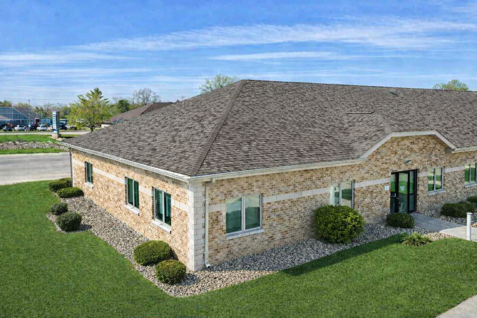 Exterior of 500 Legacy Plaza West, a brick and stone medical office building in Sagamore Business Center, La Porte